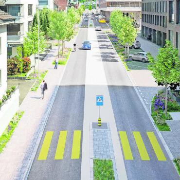 So soll die Zürcherstrasse bald aussehen: viel Grün mit Bäumen, Blumen-Rabatten, neuen Fussgängerstreifen, Strassen-Mittelstreifen und grosszügigen Trottoirs. Alles abgestimmt auf Schwesterprojekte wie die neue ÖV-Drehscheibe (im Hintergrund rechts).