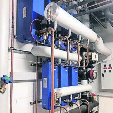 Prägend fürs Dorfzentrum - Herzstück der Gebäudetechnik: die Wärmerückgewinnung.