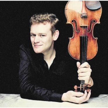 Geige und Gitarre im Zusammenspiel - 2022 erhielt Sebastian Bohren die Auszeichnung «Der Goldene Bogen», verliehen durch die Stiftung Schweizer Geigenbauschule. Bild: pd